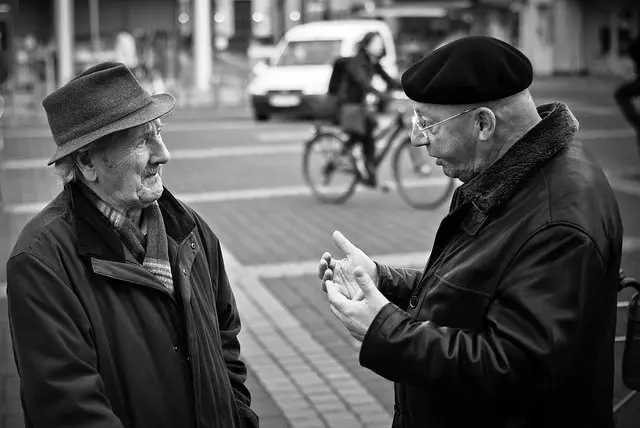 Older men talking in the street