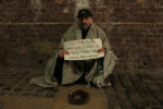 homeless man asking for spare change