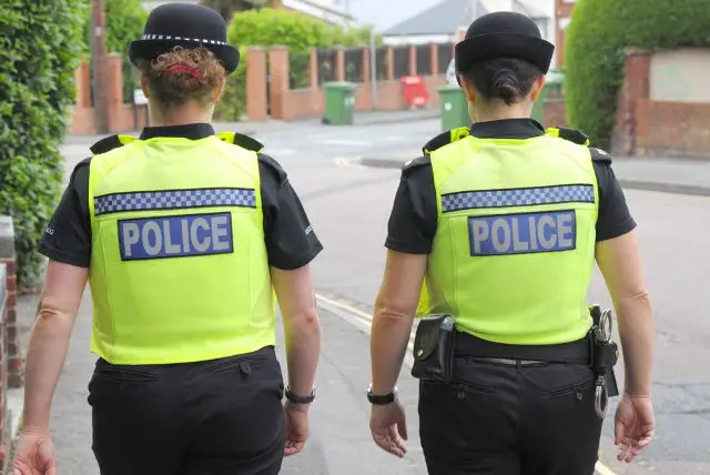 hampshire police officers walking away