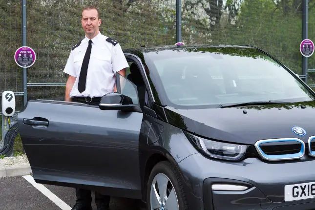 Insp Andy Tester with electric car