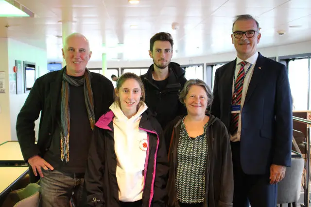 Victoria of Wight’s first customers - the Francis family from Hammersmith with Wightlink Chief Executive Keith Greenfield on the Bridge of Wightlink’s new flagship