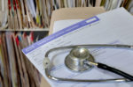 gp papers and stethoscope
