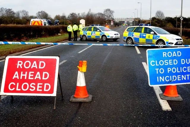 road closed by police due to accident