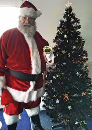 David Rogers as Santa