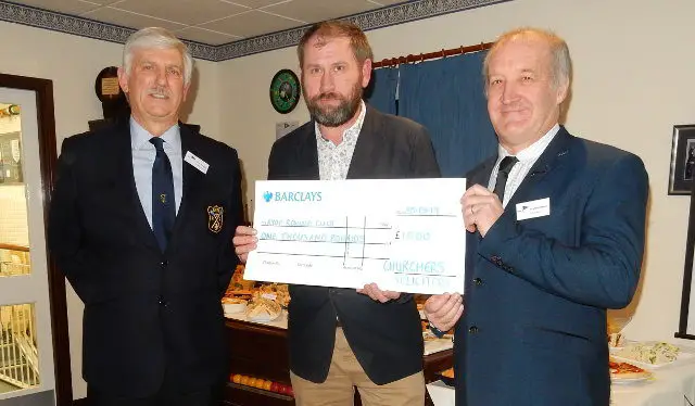 Ian Heal, Churchers Solicitors present a cheque to the Ryde Clubs President and Captain.