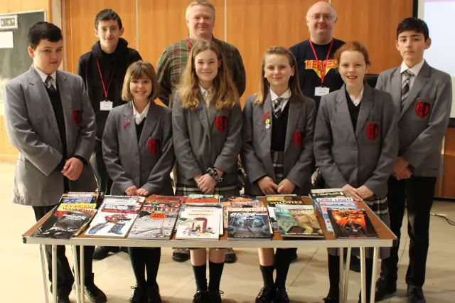 cowes enterprise college pupils with Graphic Novel library donation