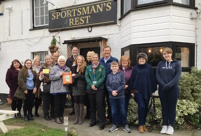 Outside the sportsman rest pub with new defibrillator from the wight strollers