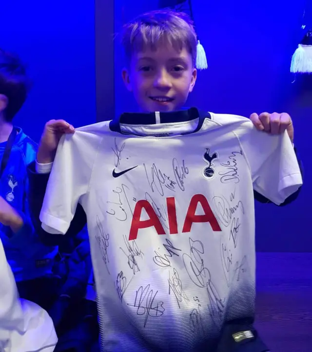 Nicholas Gregory with his autographed Spurs shirt 