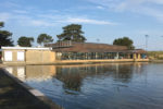 WATERSIDE SWIMMING POOL BUILDING AS VIEWED FROM THE BOATING LAKE