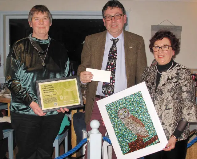 Cllr Lilley and his sister, Grete Steen (left), presenting Award to Carol Court of Ability Dogs