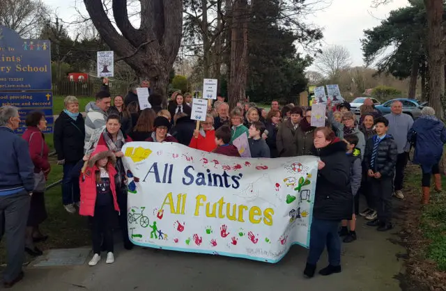 Community against All Saints closure 