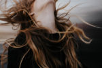 woman's hair blowing in the wind