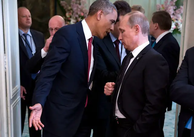 President Obama talking to President Putin at the Whitehouse