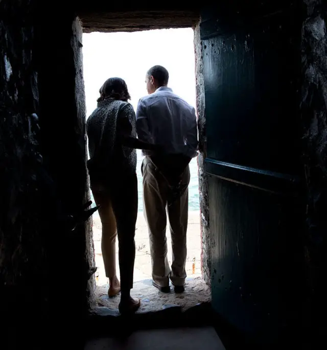 President Barack Obama and First Lady Michelle Obama stand in the Door of No Return while touring the Masion des Esclaves Museum on Goree Island, Senegal, June 27, 2013 Official White House Photo by Pete Souza