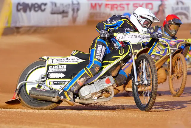 Riders B Wilson(W) G Wood(R) A Extance(Y) on speedway track