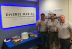 Three staff members celebrating Diverse Marine First Anniversary