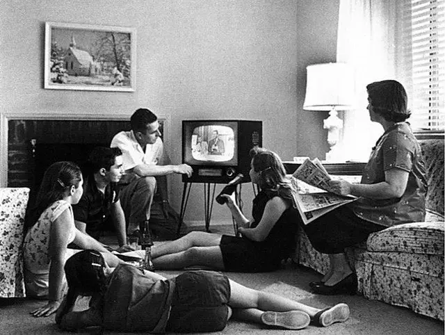 Family watching television in 1958