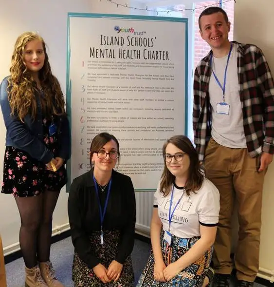Young people with the new mental health charter