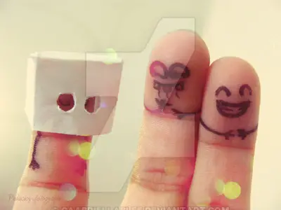 Faces drawn onto finger tips with one displaying shame