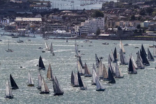 Fastnet Race start line in Cowes with many yachts on the water