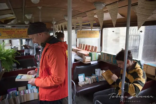 People on the Book bus looking at books