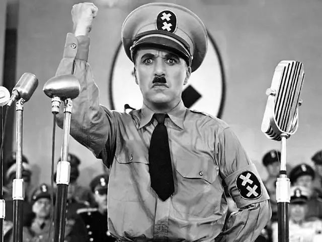 Charlie Chaplin as Adolf Hitler in the film The Dictator