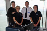 Emma, Jo and Katie from ORCA with Captain Dave Booker