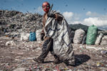 Honduras dump boy with spiderman mask on
