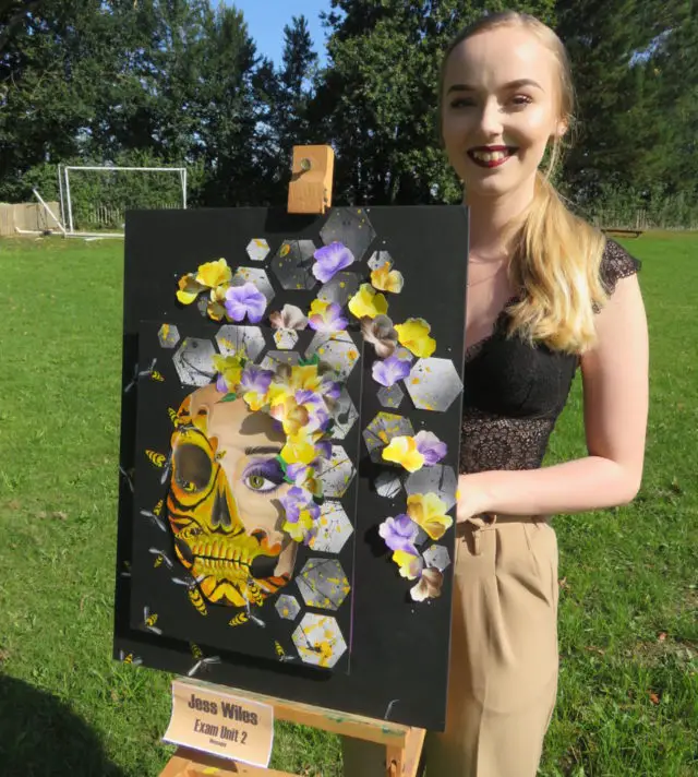 Jessica Wiles with her the artwork that her a Grade 9 (A**) in Art & Design
