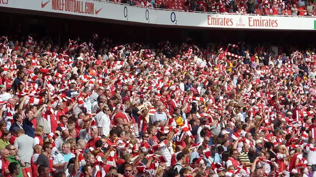 arsenal supporters watching a football match