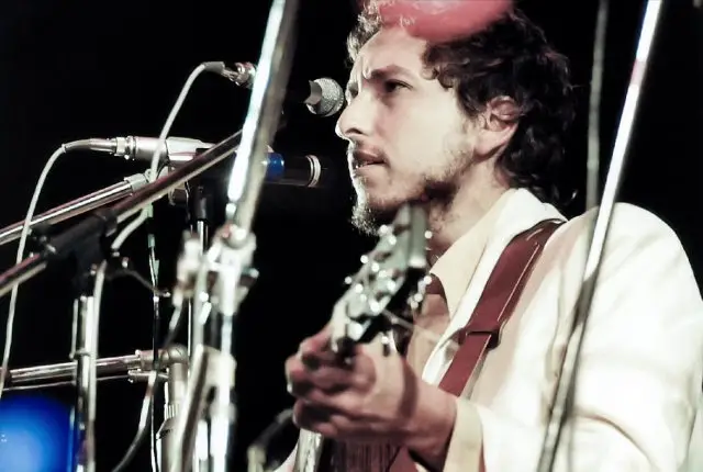 Bob Dylan performing on stage in 1969
