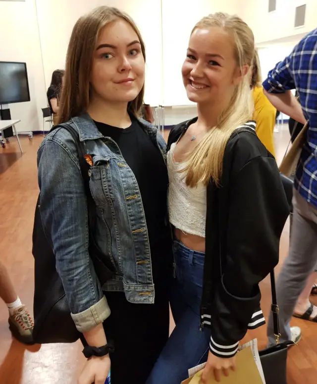 Two female pupils celebrating their GCSE results