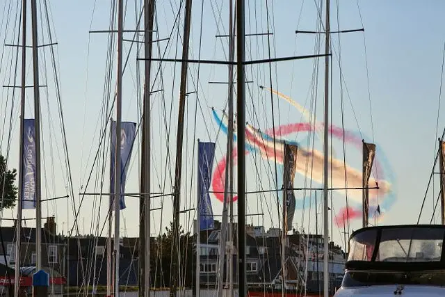 red arrows and yacht masts