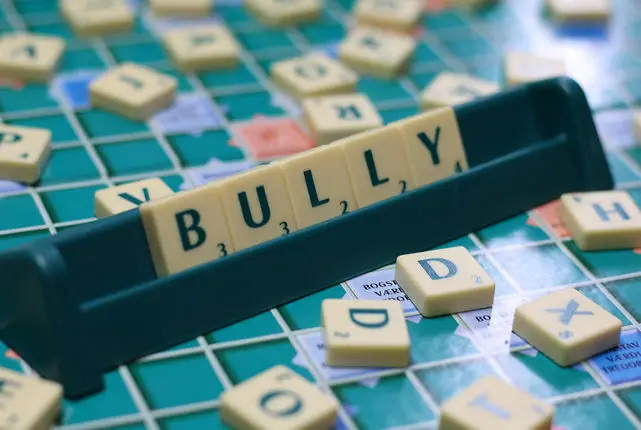 bully spelled out in game of scrabble
