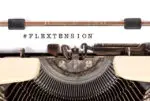 typewriter with flextension typed on paper