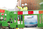 wightfibre workmen putting in cable in street