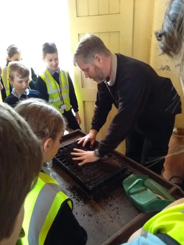 Community Kids at Osborne House Gardens learning about planting