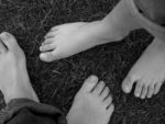 two pairs of bare feet