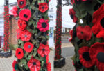Knitted and crocheted poppies on the Town Arch