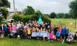 yarmouth school - pupils and parents with save our school banner