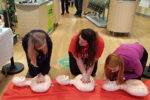 Specsavers staff learning CPR