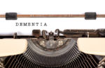 dementia spelled out on typewriter by Trending Topics
