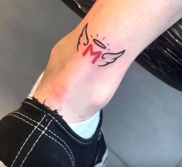 Michaela's angel wings tattoo ensure a lasting memory