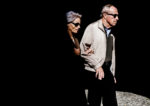Blind man and his wife - both wearing dark glasses