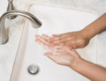 person washing hands