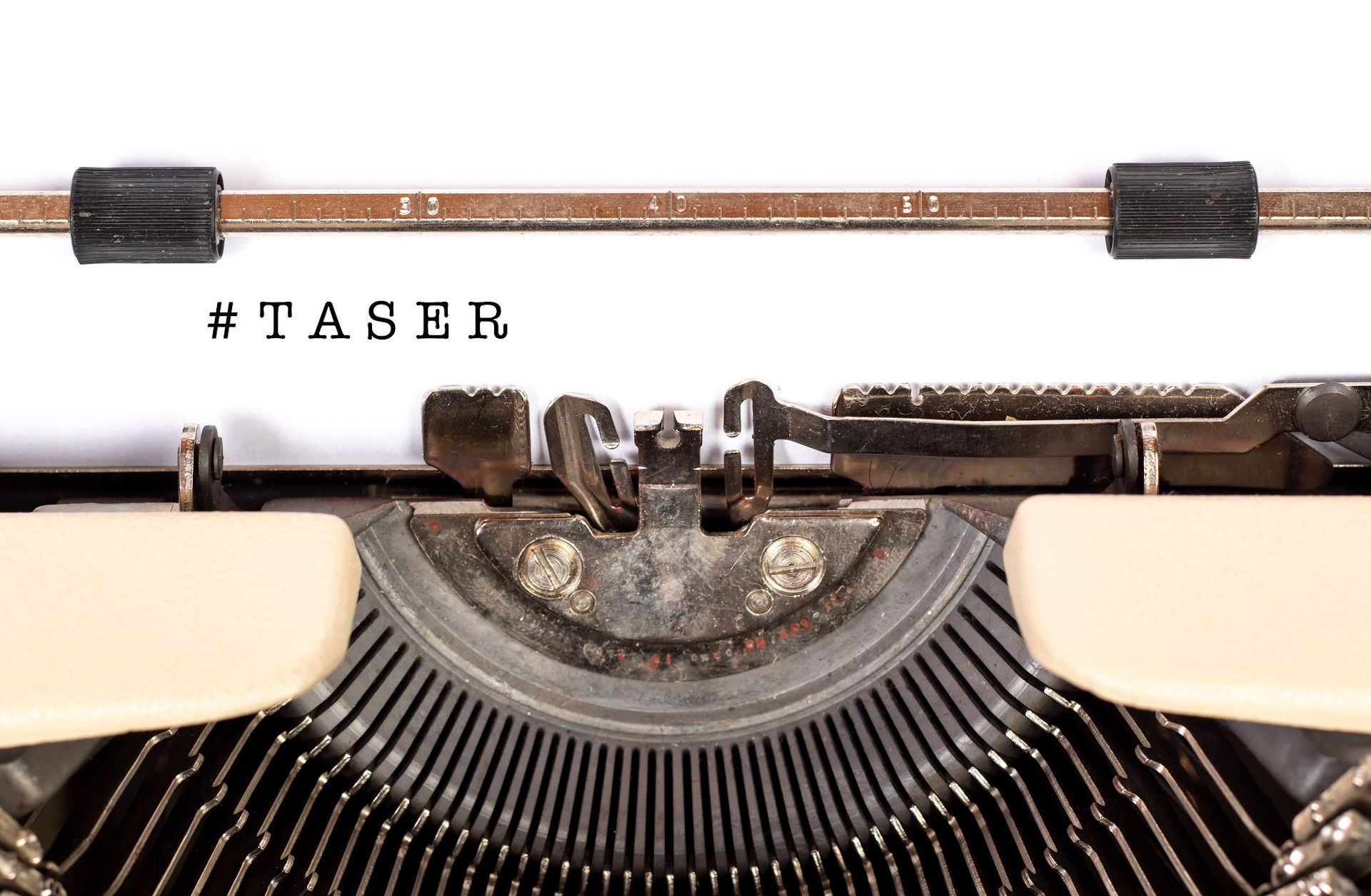 taser on typewriter