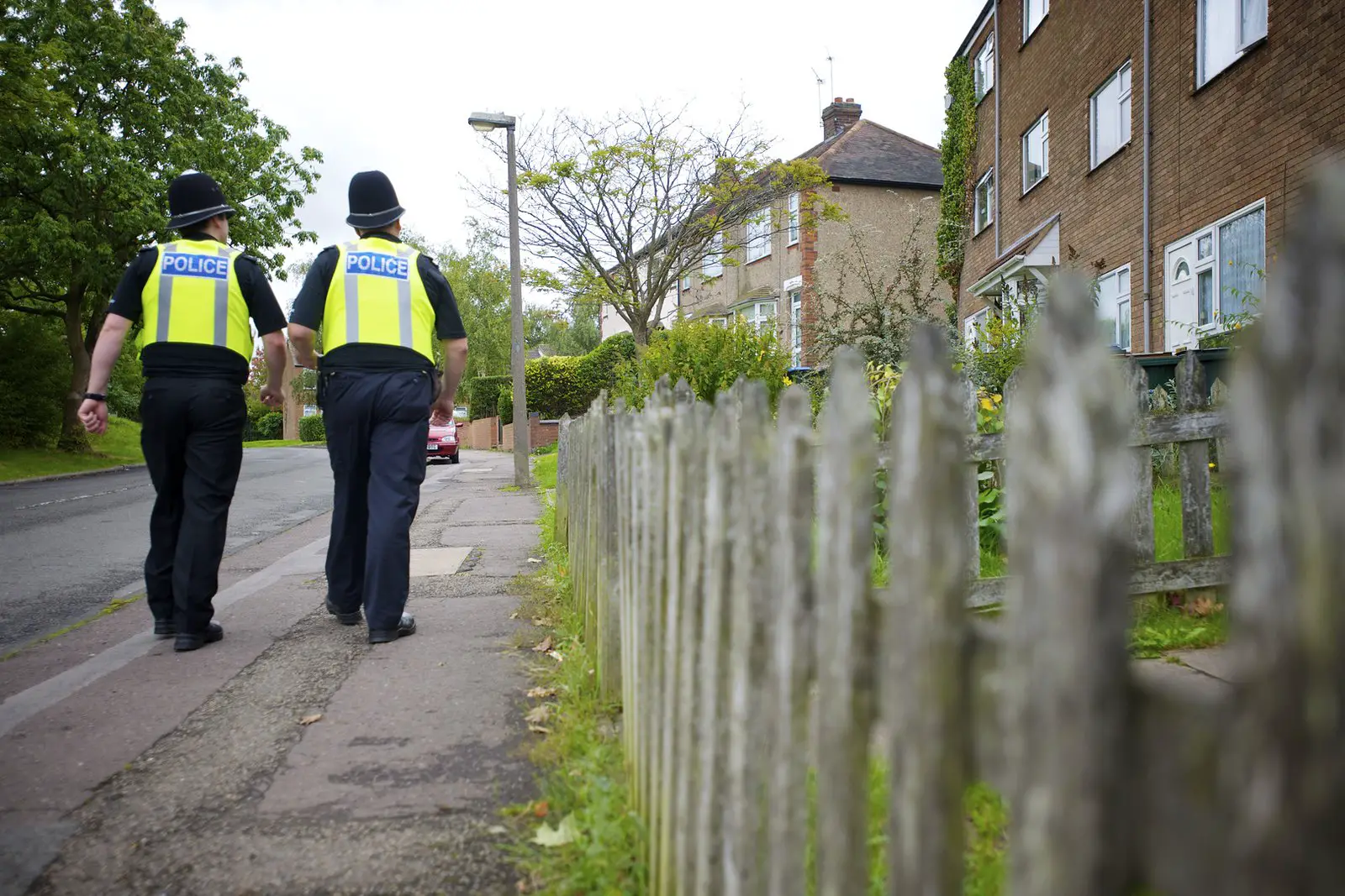 Special Constables walking down a residential street