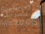 Superheroes wear scrubs graffiti taken by Katharine Grice