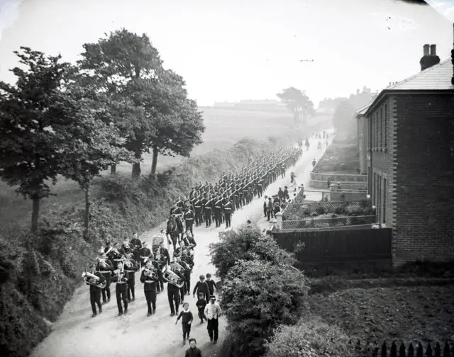 Soldiers and band marching on the Isle of Wight