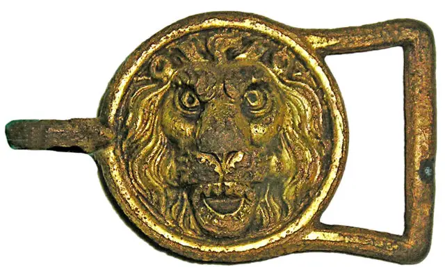 Lion head buckle from the HMS Pomone